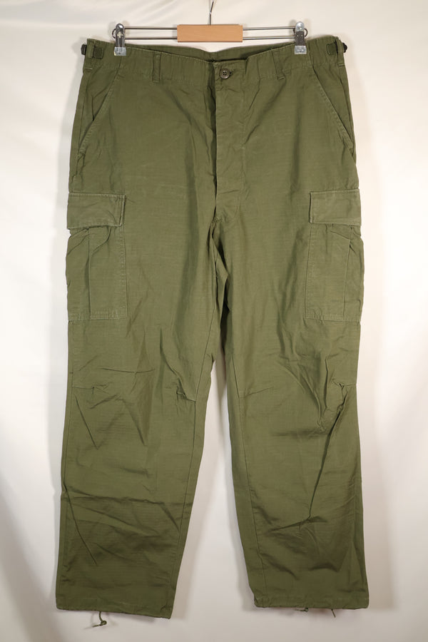 1967 Contract L-L 4th Model Jungle Fatigue Pants in good condition, faded, used.