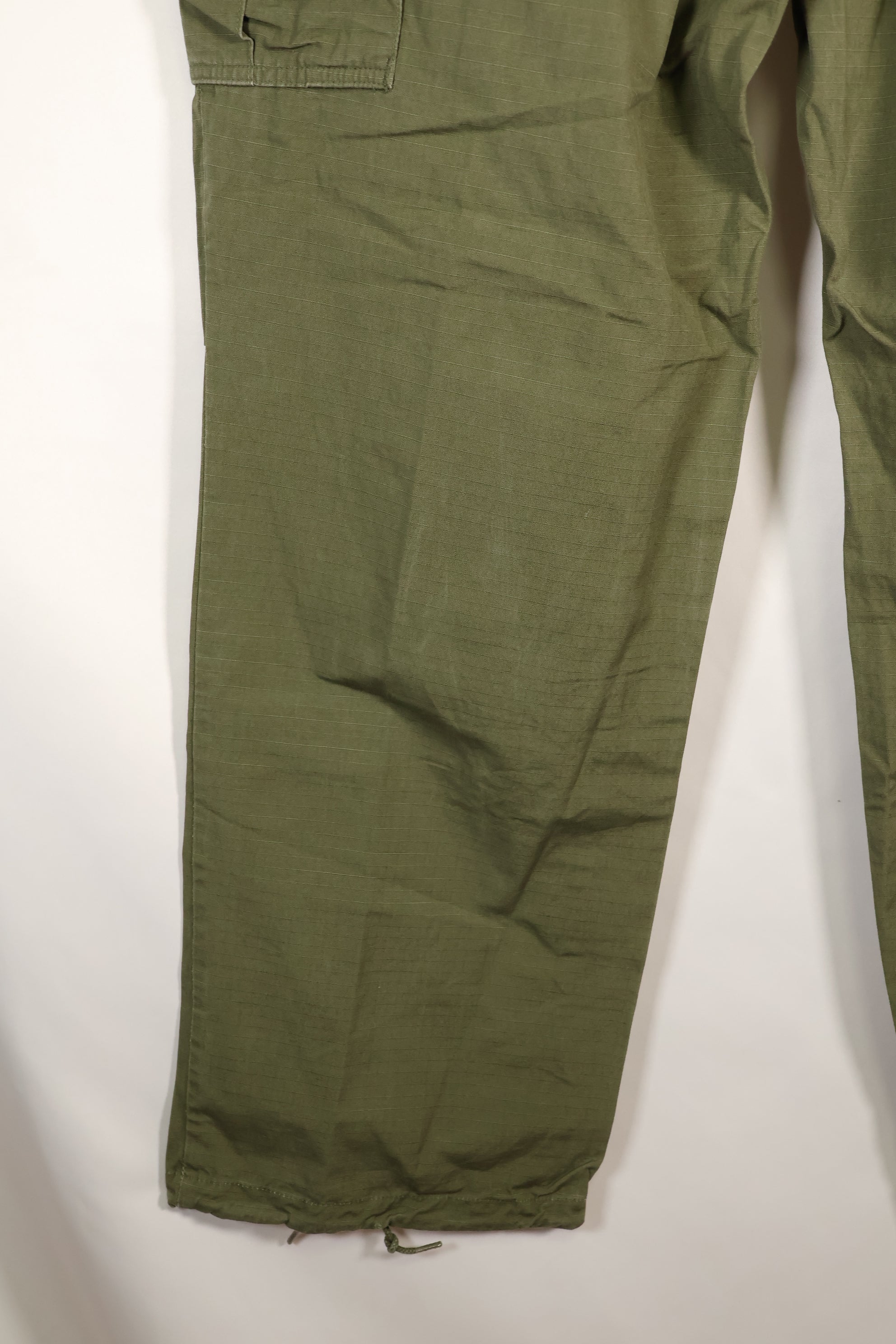 1967 Contract L-L 4th Model Jungle Fatigue Pants in good condition, faded, used.
