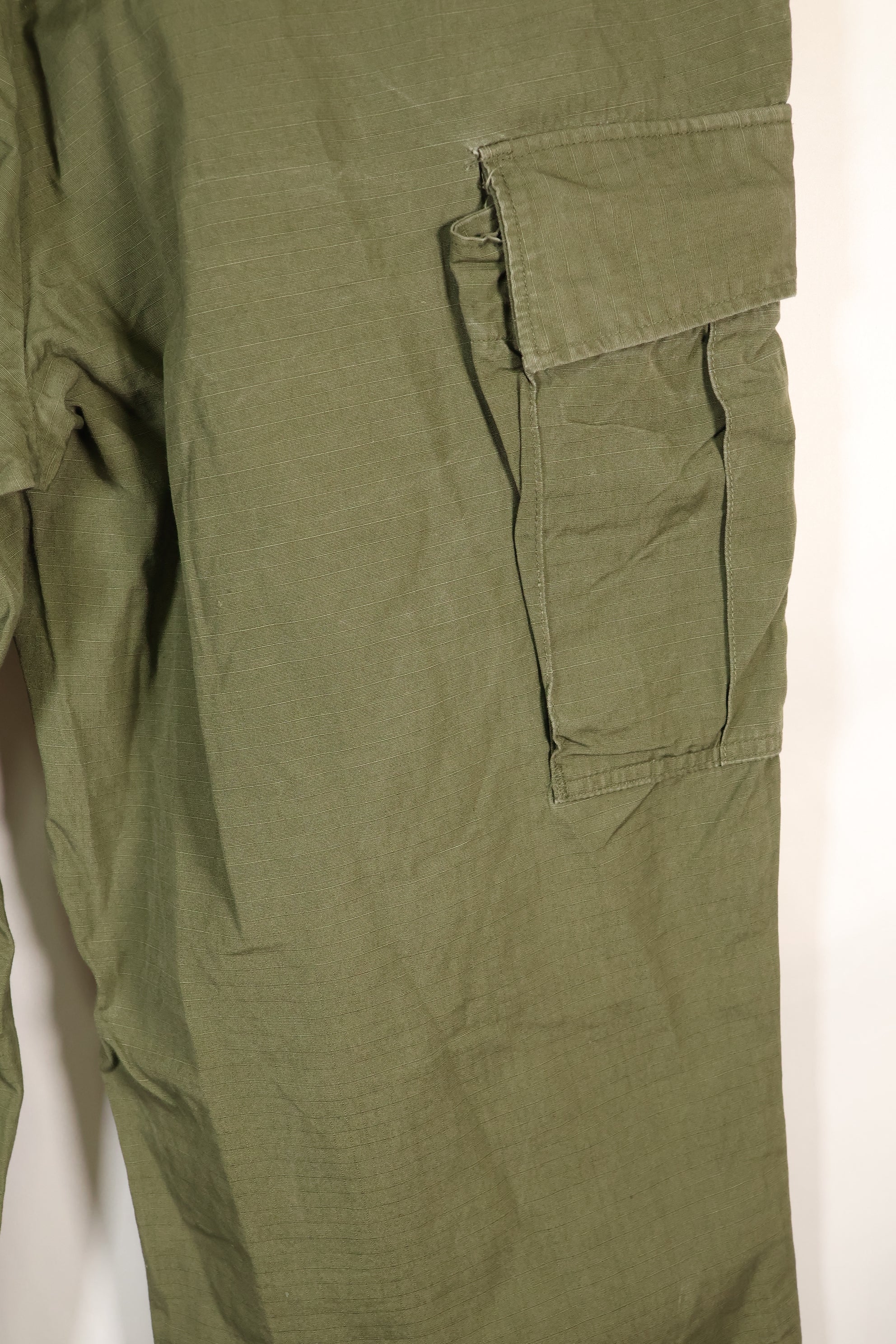 1967 Contract L-L 4th Model Jungle Fatigue Pants in good condition, faded, used.