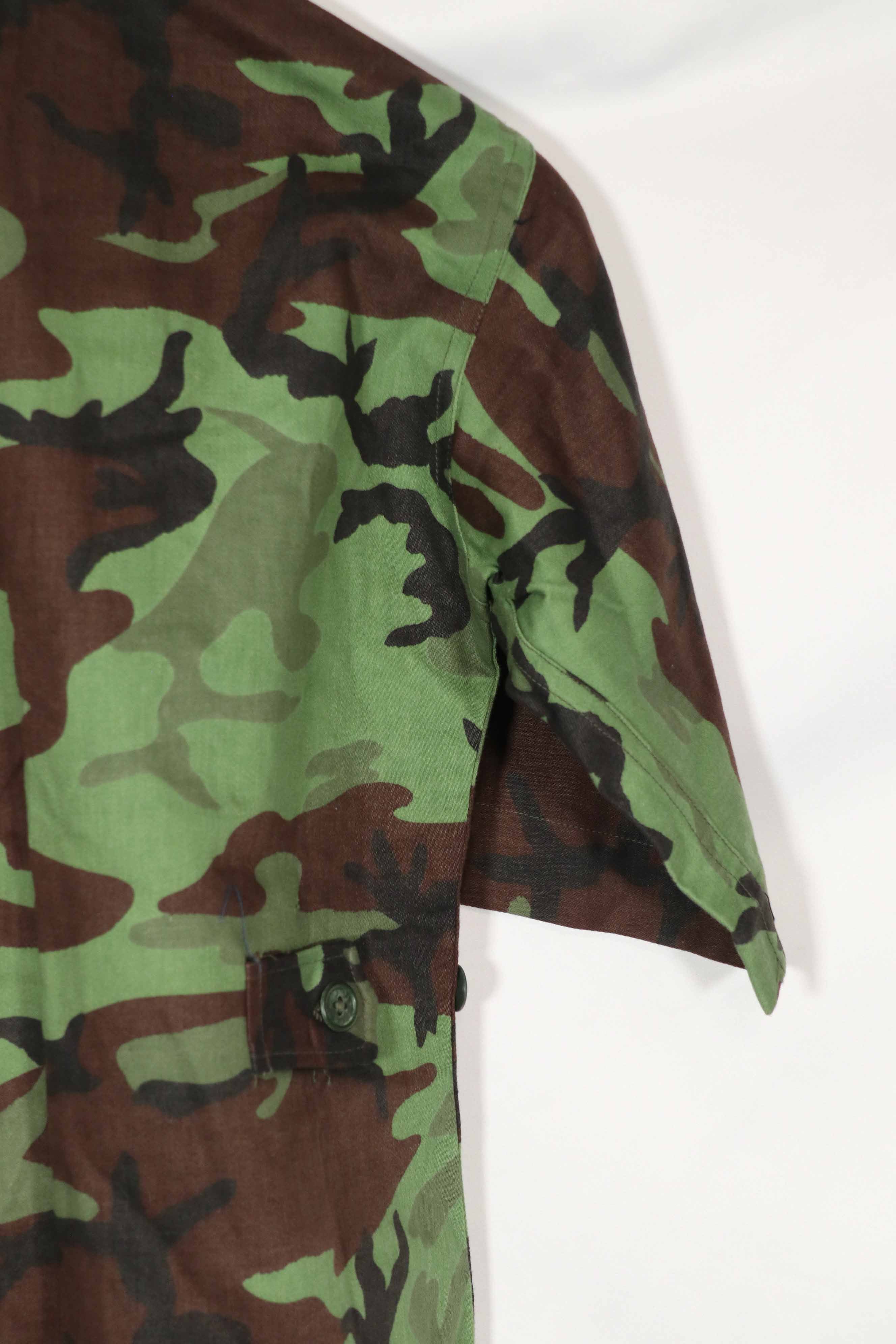 Real Unused South Vietnamese Ranger leaf camouflage jacket with short sleeves.
