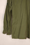 Real 1970 Australian Army OD Fatigue shirt with rank insignia, size unreadable.