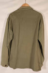 Real 1940s U.S. Marine Corps USMC M41 HBT utility jacket, faded, stained.