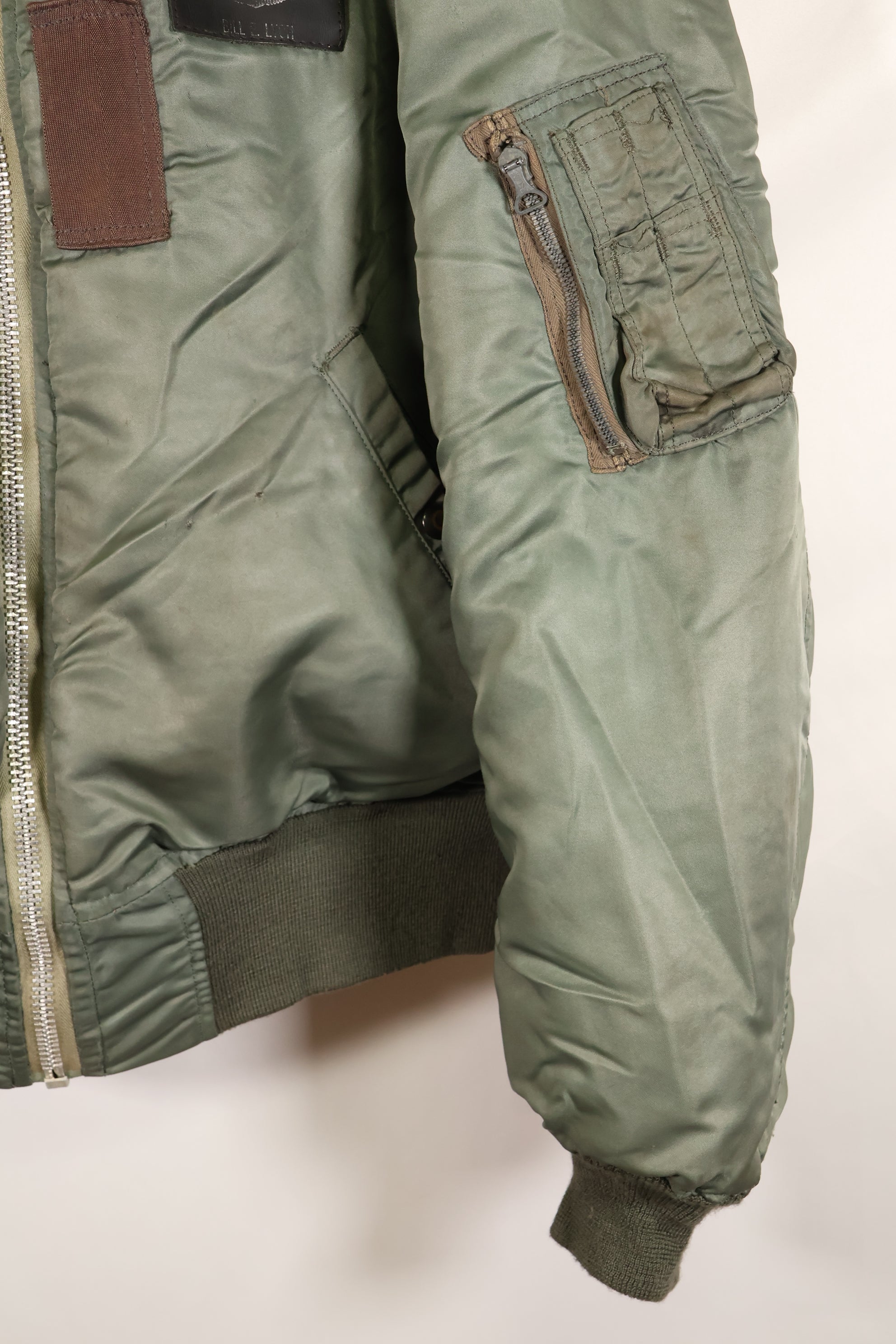 1950s, estimated size 40–42, U.S. Air Force B-15D flight jacket, modified with shearling, includes patches, used