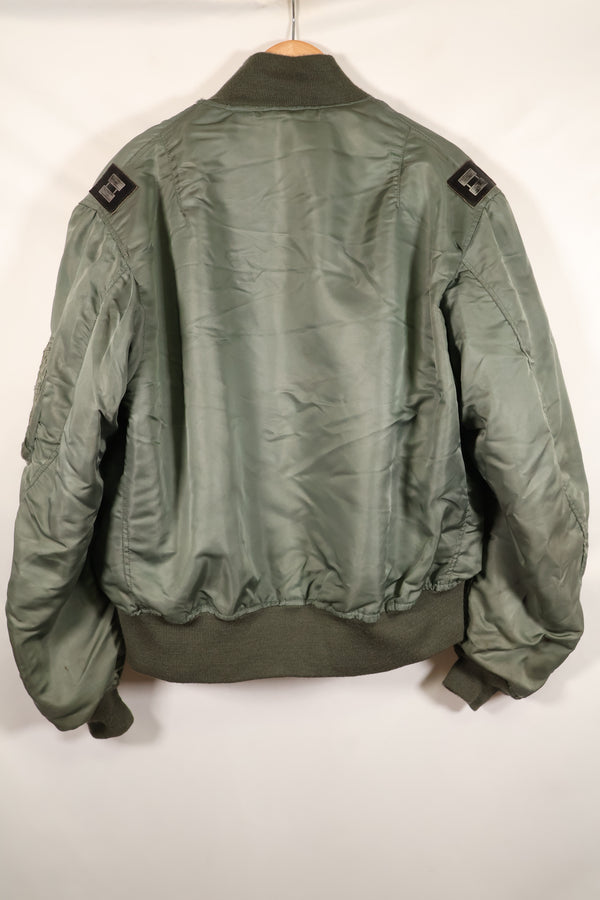 1950s, estimated size 40–42, U.S. Air Force B-15D flight jacket, modified with shearling, includes patches, used