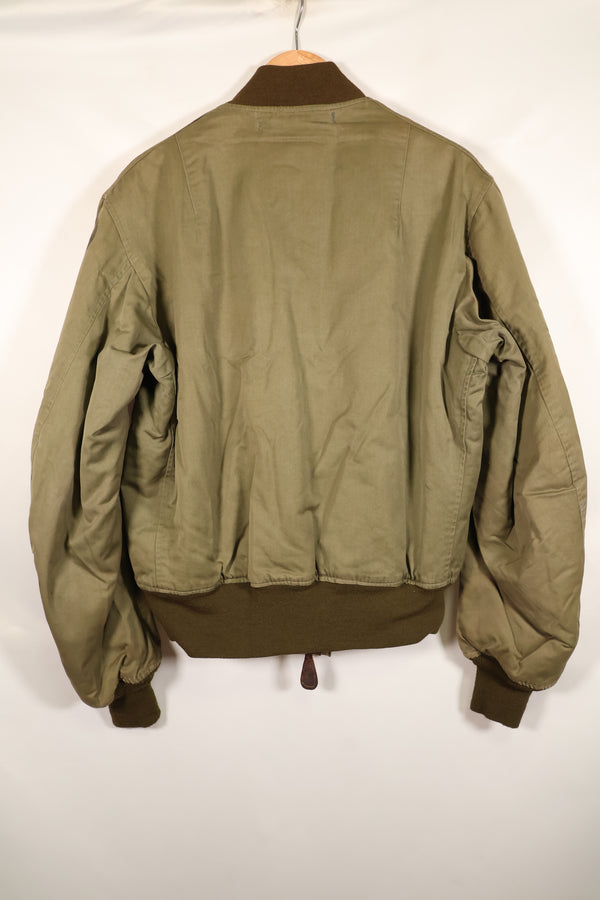 1940s, estimated age 38–40, U.S. Army Air Forces (USAAF) B-15A flight jacket, modified with shearling, used