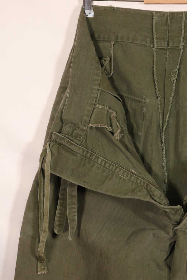 Real 1940s WWII US made British Army HBT jungle trousers, used.