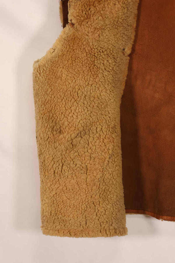 Civilian 1960s-70s sheepskin vest, used, scratches, stains.