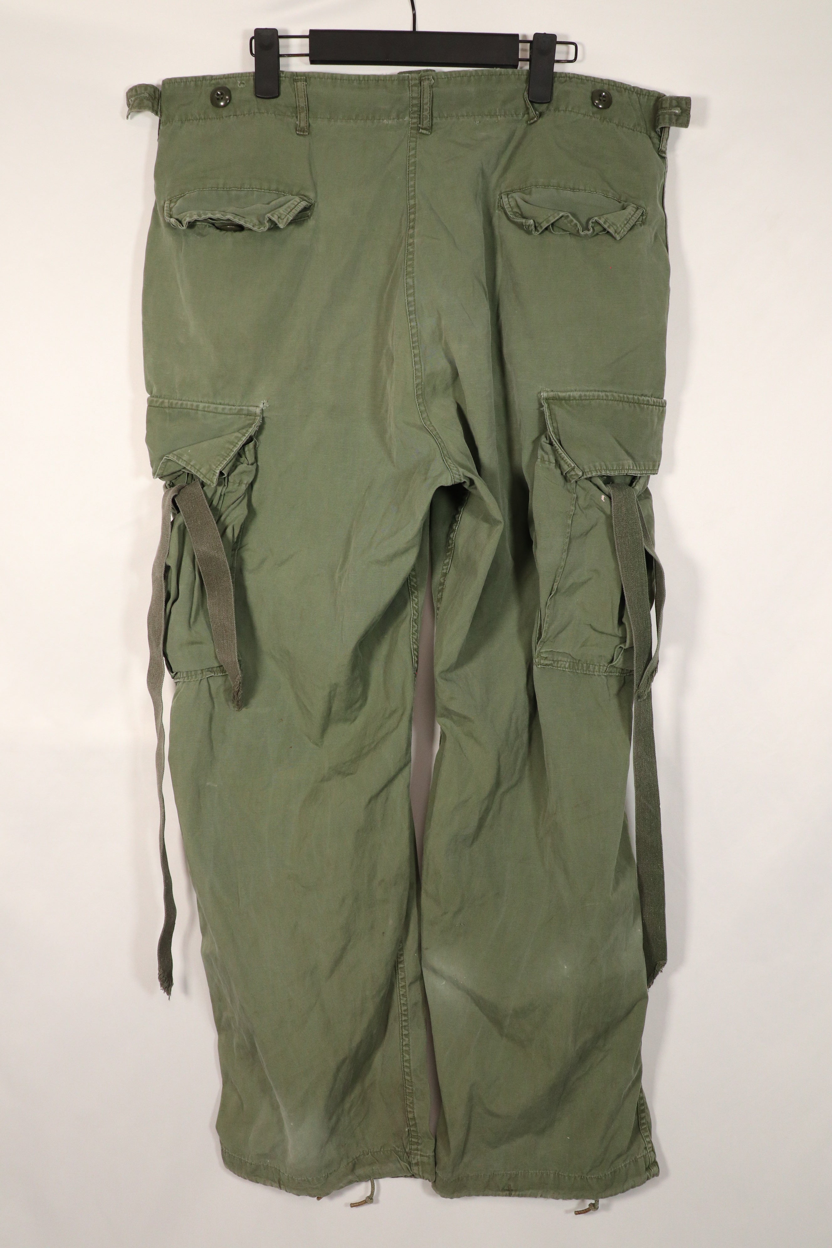Real 2nd Model Jungle Fatigue Pants with leg ties, large size, stained, used.
