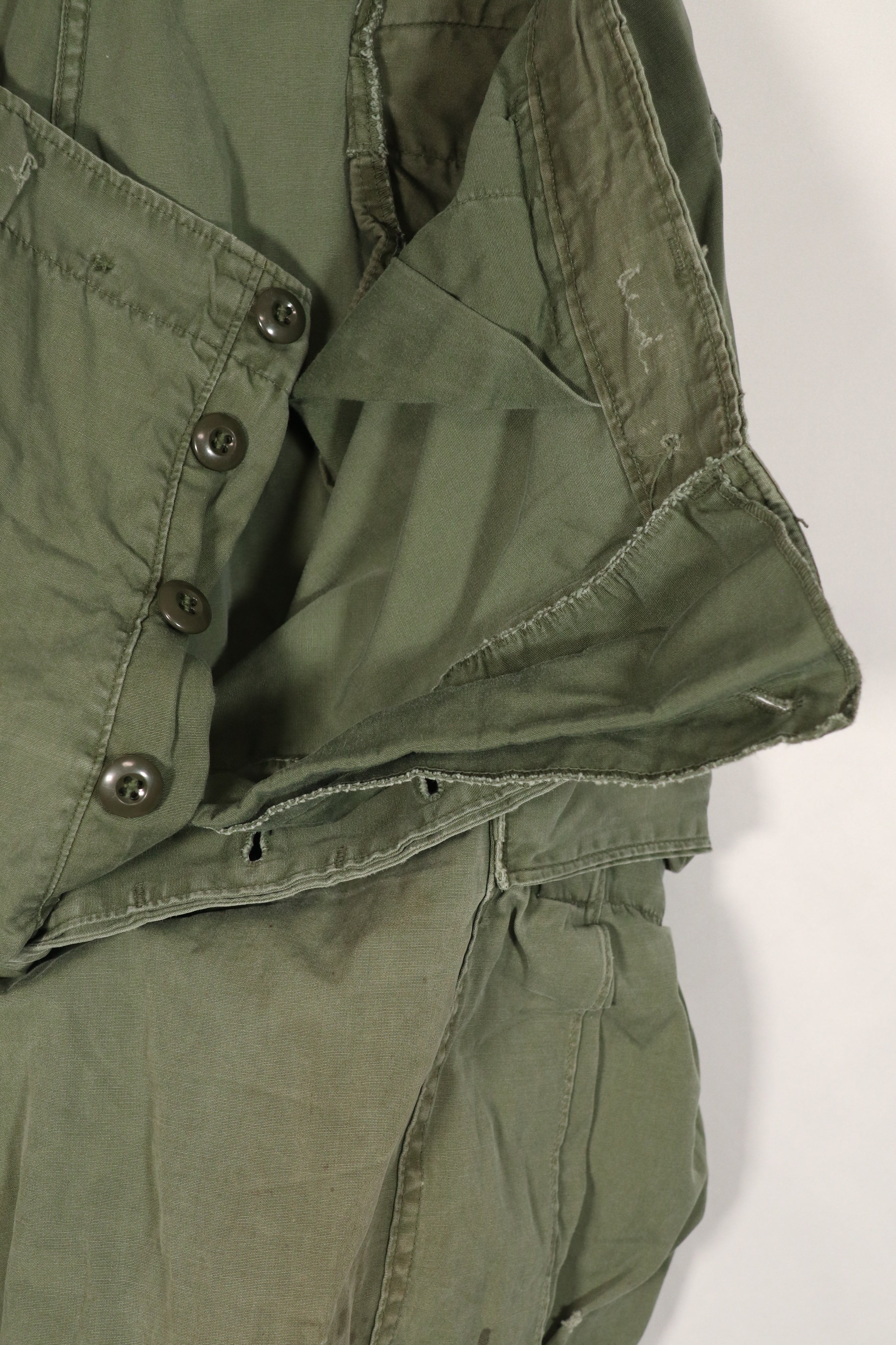 Real 2nd Model Jungle Fatigue Pants with leg ties, large size, stained, used.