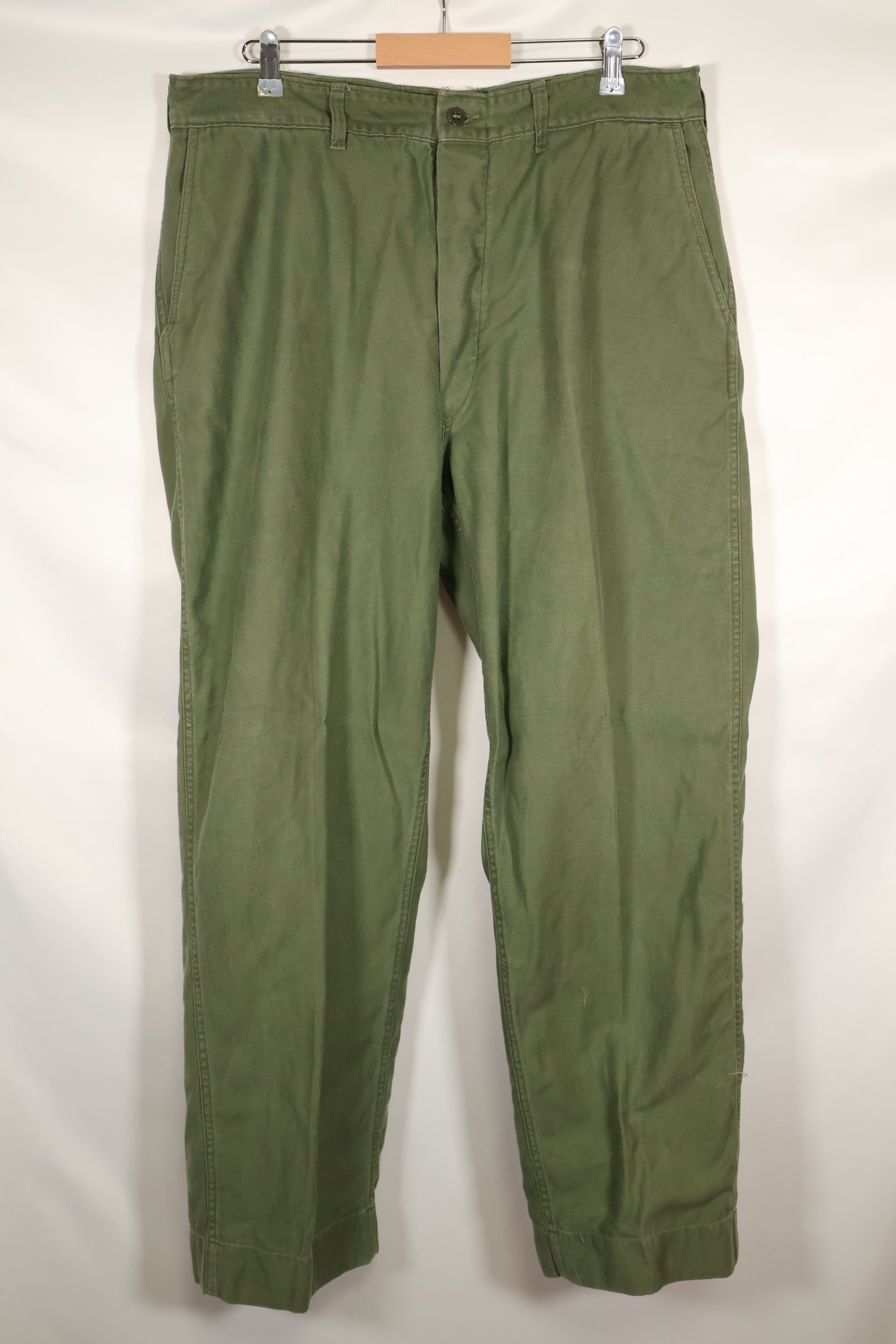 1960s lot, estimated 36 approx USMC P-56 utility pants, used.