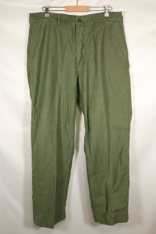 1960s lot, estimated 36 approx USMC P-56 utility pants, used.