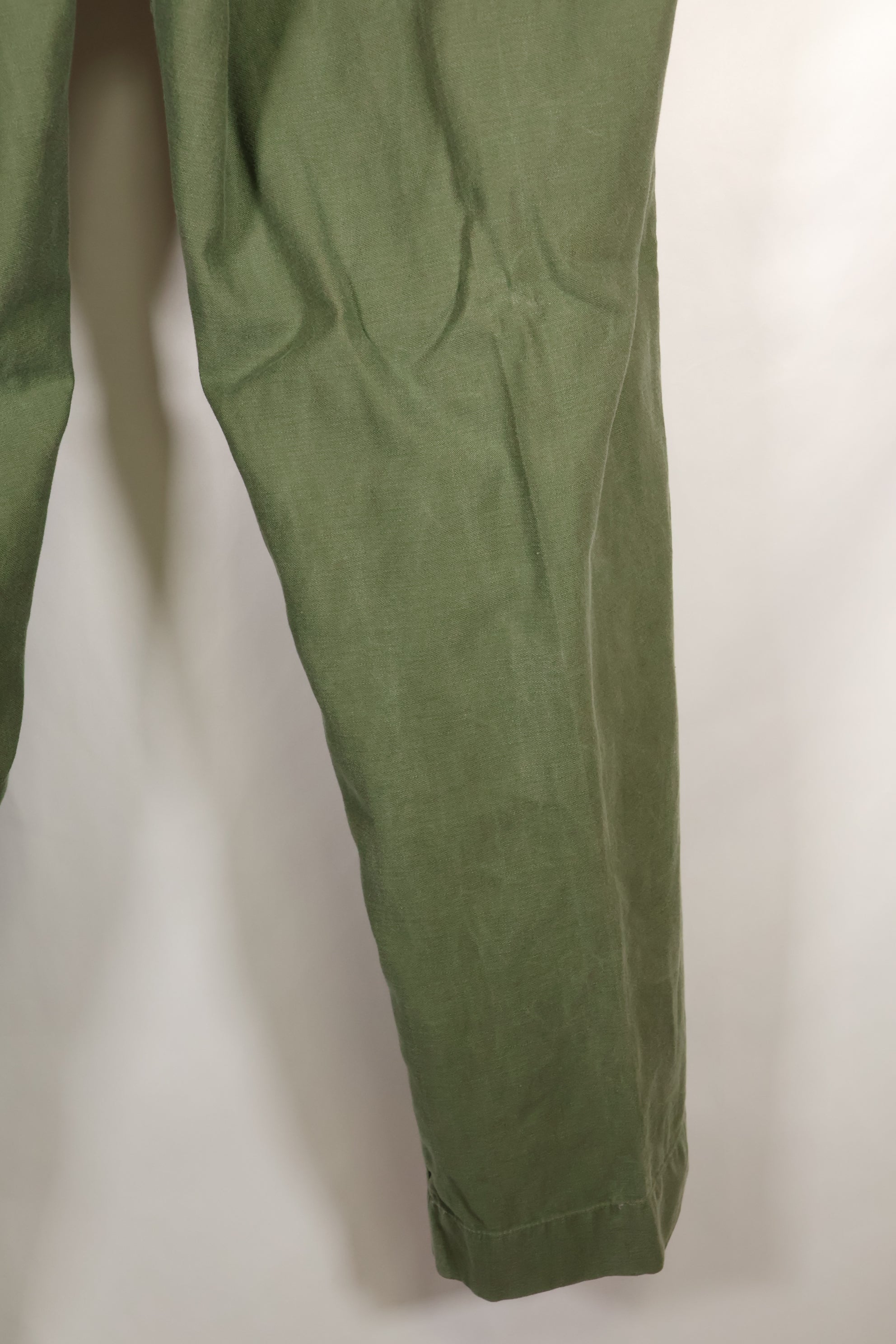 1960s lot, estimated 36 approx USMC P-56 utility pants, used.