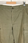1969 Contract M-R 4th Model Jungle Fatigue Pants, stained, faded, used.