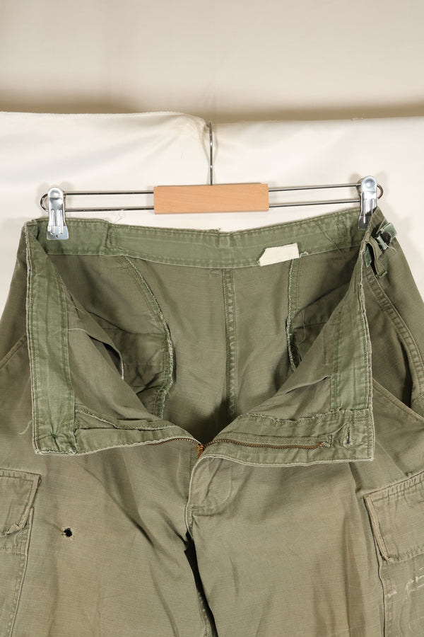 1969 Contract M-R 4th Model Jungle Fatigue Pants, stained, faded, used.