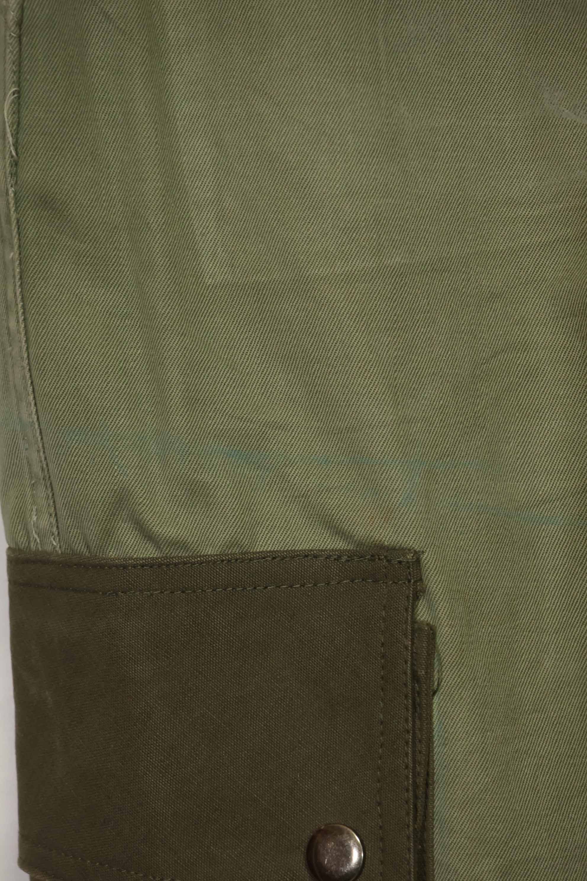 1940s-50s U.S. Army M45 cotton field pants with modified cargo pockets, airborne use, used, A