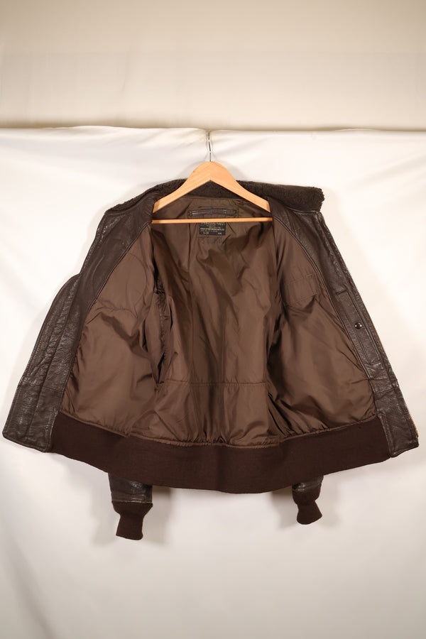 1971 contract size 44 G-1 flight jacket, painted, patches, used.