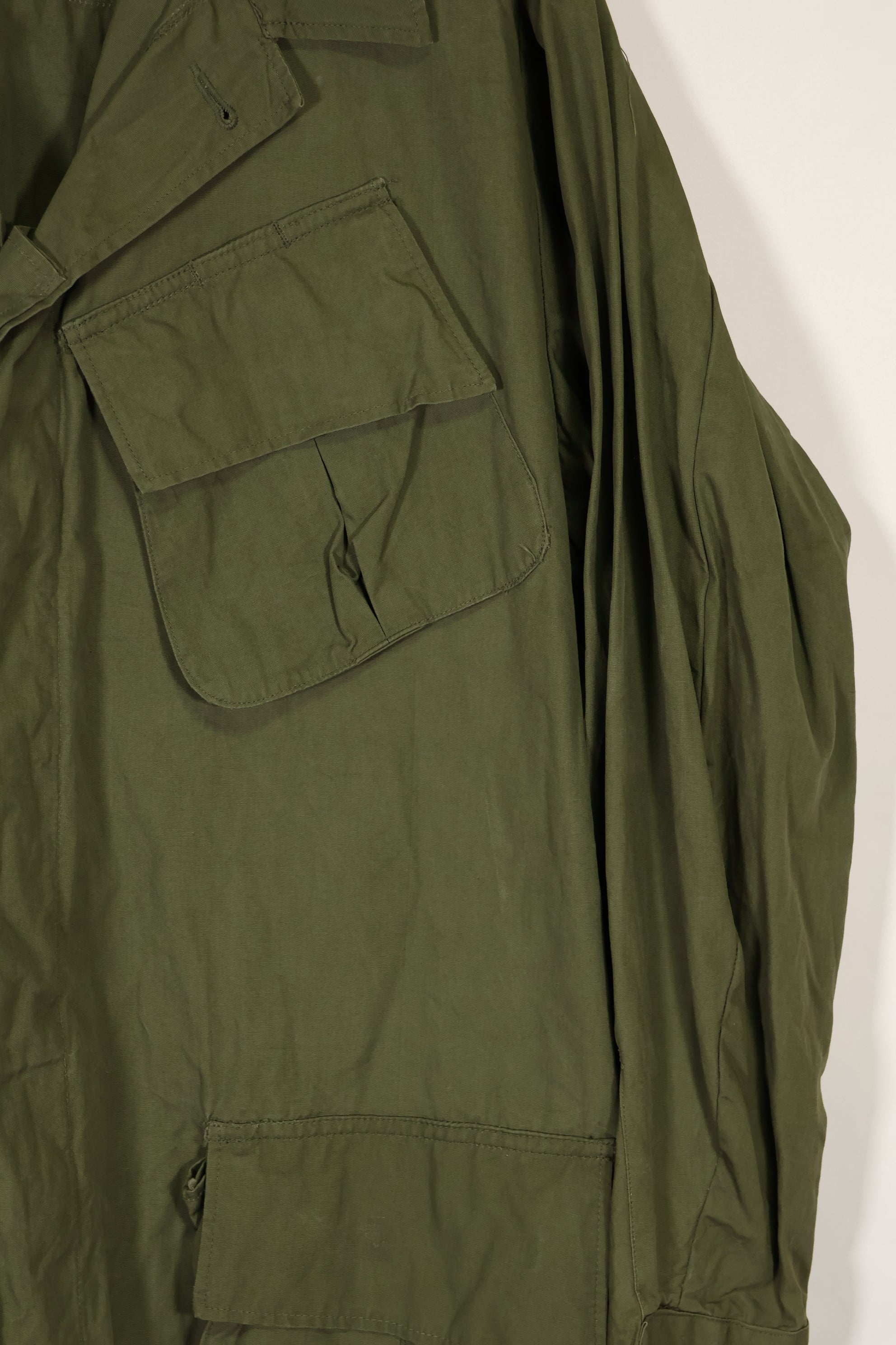 Real 1966-1967 3rd Model Jungle Fatigue Jacket L-R with damage.