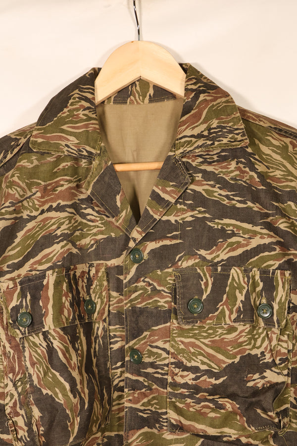 Late 1960s | Locally made | Estimated to be made in Vietnam or Thailand | Tiger-striped shirt | Used