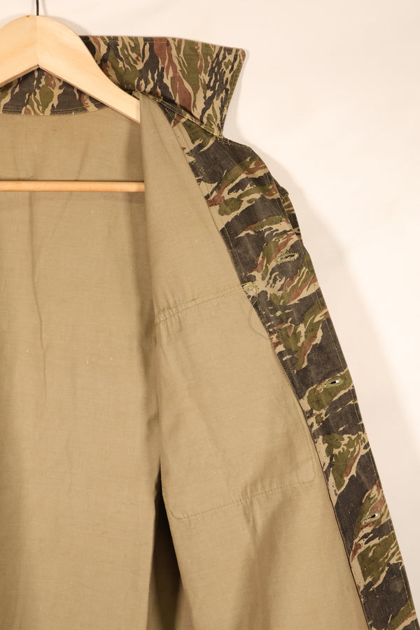 Late 1960s | Locally made | Estimated to be made in Vietnam or Thailand | Tiger-striped shirt | Used
