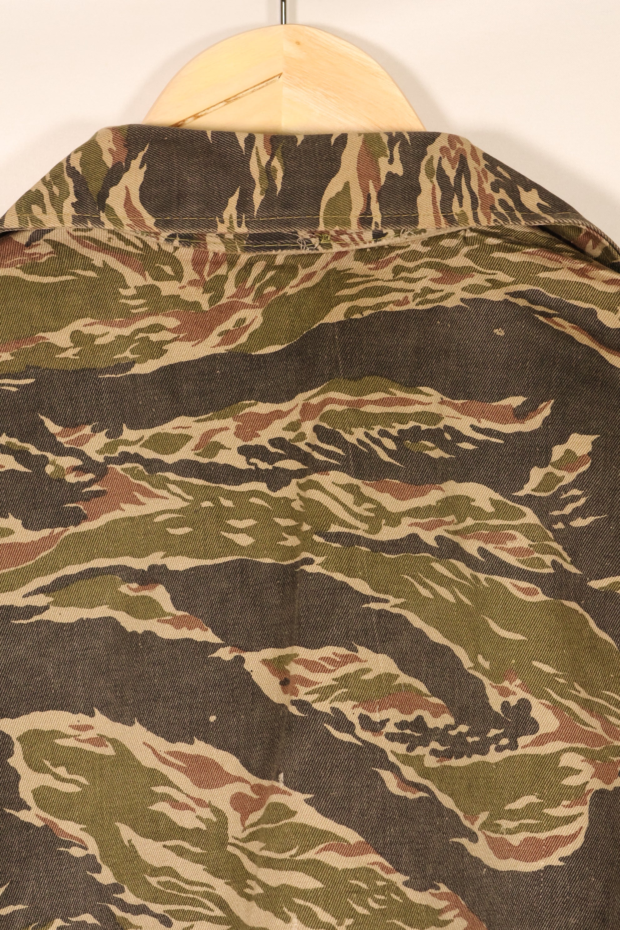 Late 1960s | Locally made | Estimated to be made in Vietnam or Thailand | Tiger-striped shirt | Used