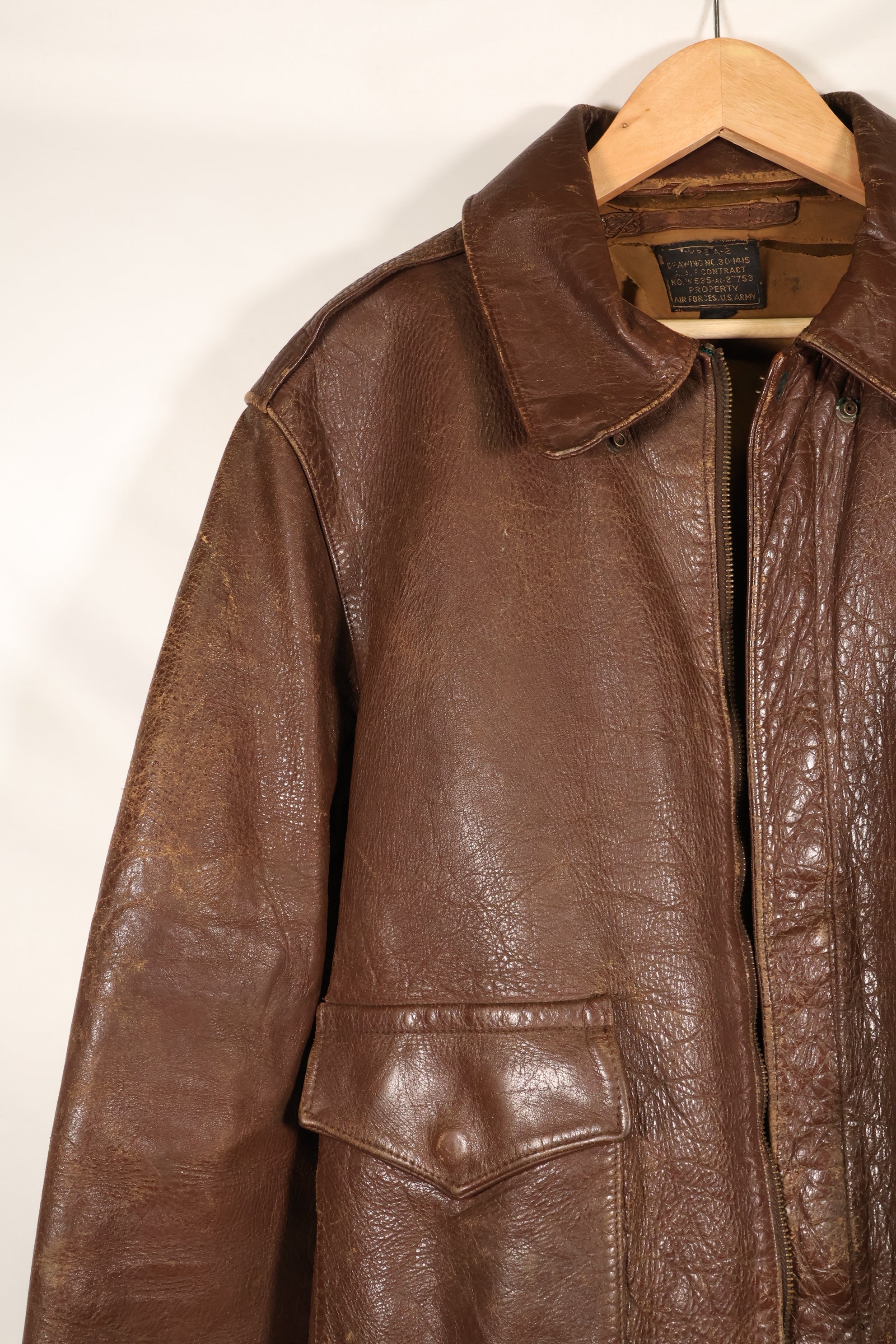 1940s size 42 WWII U.S. Army Air Corps USAAF A-2 flight jacket with name, used.