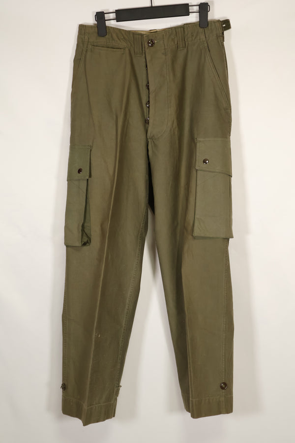 Real U.S. Army M45 pants with additional pocket modification, used.