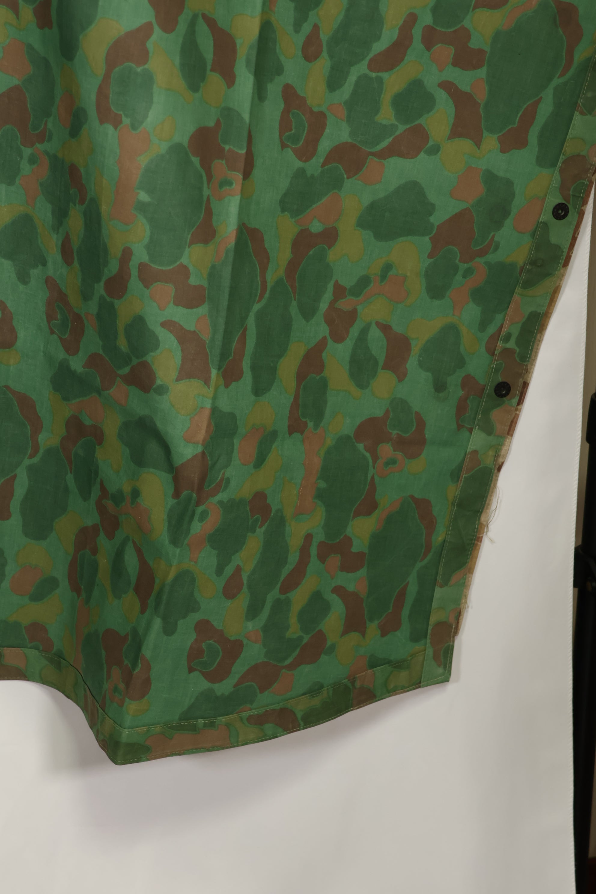 Real 1944 USMC frogskin camouflage rubberized rain poncho, good condition, used.