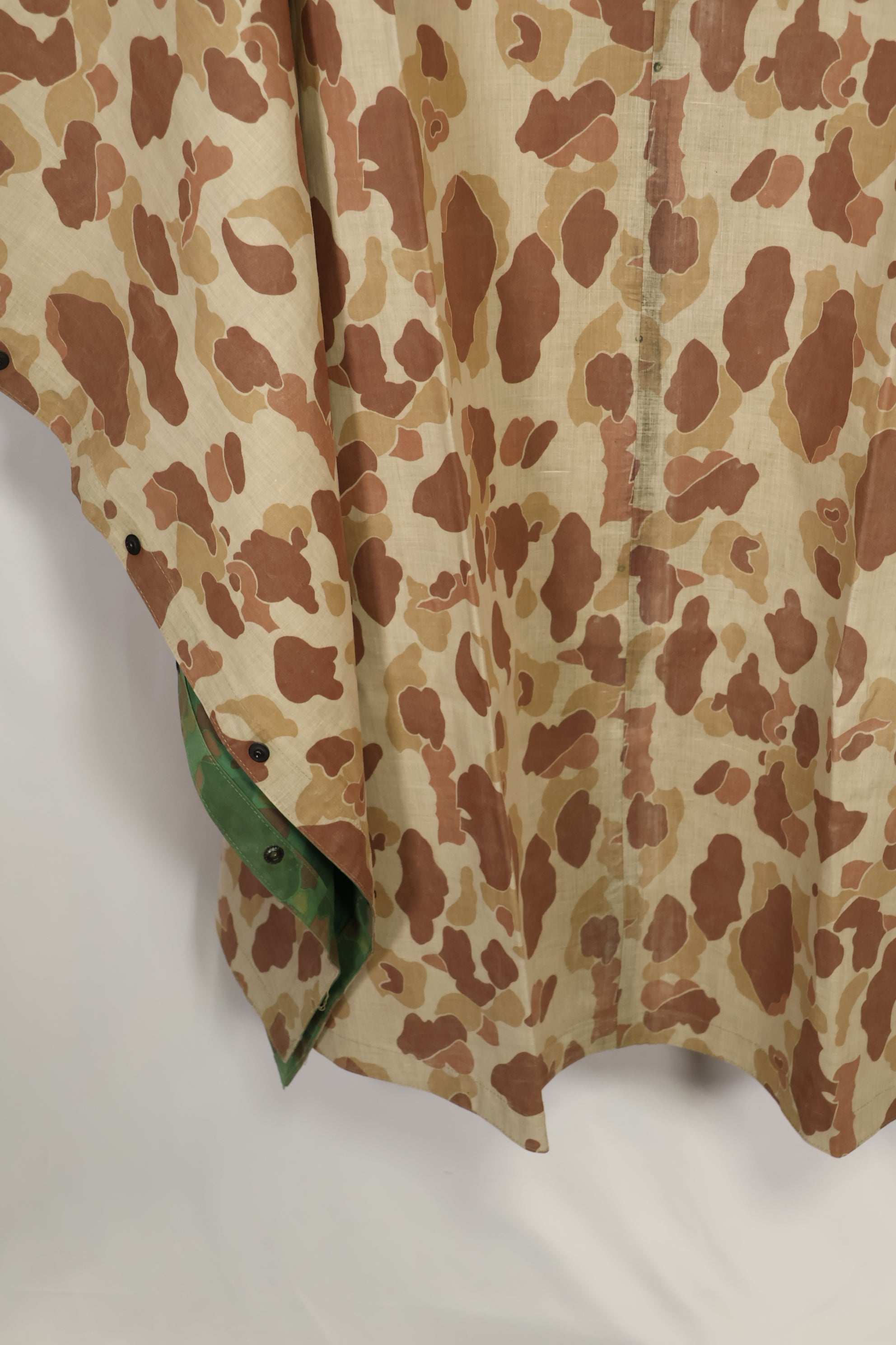 Real 1944 USMC frogskin camouflage rubberized rain poncho, good condition, used.