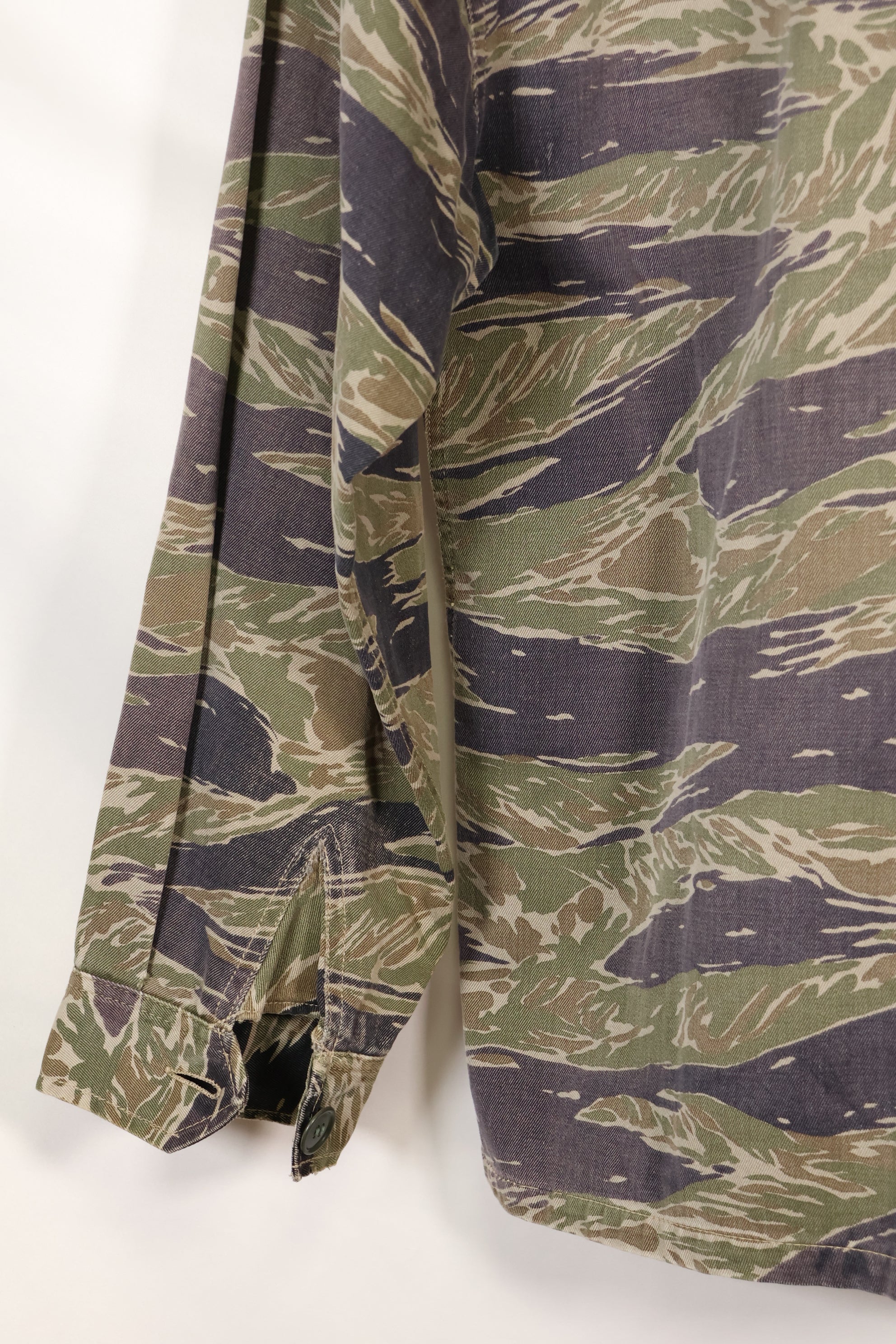 Mid-1960s Japanese Silver Tiger Asian Cut shirt with faded tiger stripes, used.