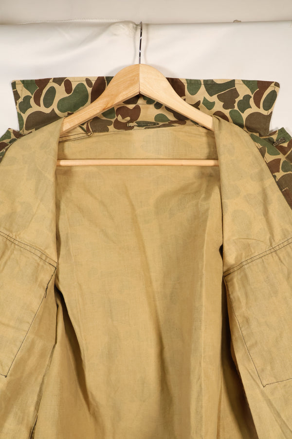 1970's manufactured in Okinawa, Japan, Beogum camouflage duck hunter hunting shirt, used.