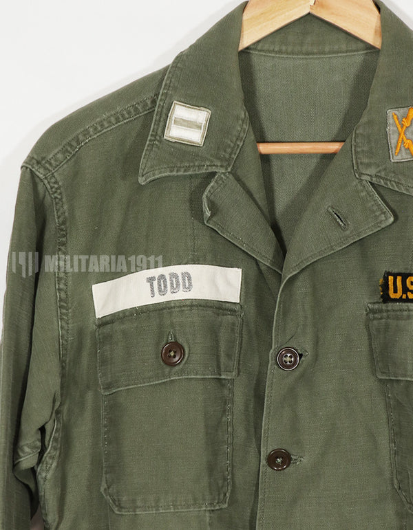 Real early OG-107 utility shirt with special forces patch, faded, used.