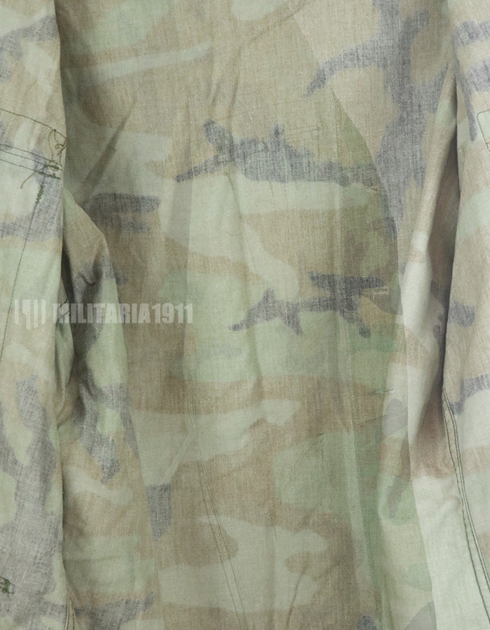 Original U.S. Army Woodland Camouflage Jacket with patches, 1990.