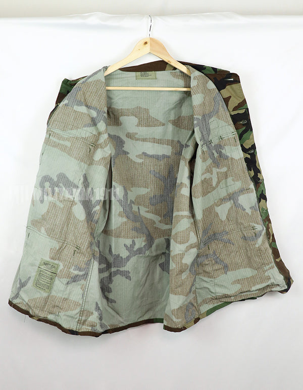 Real U.S. Army Woodland Camouflage Jacket, 2000, with patches.