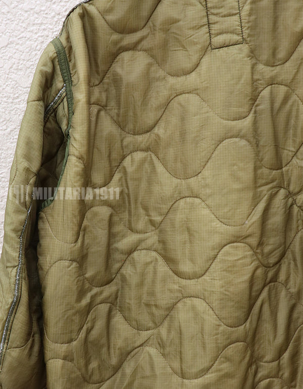 U.S. Army M65 Field Jacket Liner, 1988, partially damaged.