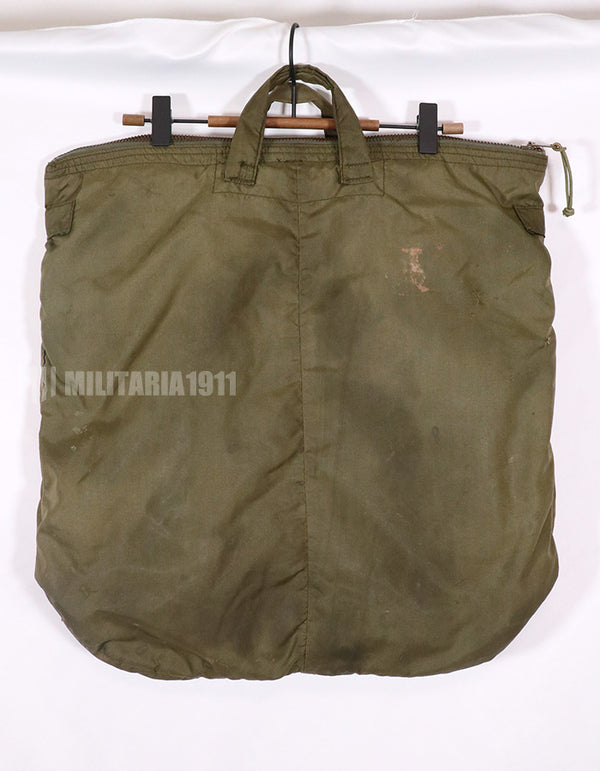 Original U.S. military release, 80's, helmet bag, poor condition, stained, age tag unreadable.