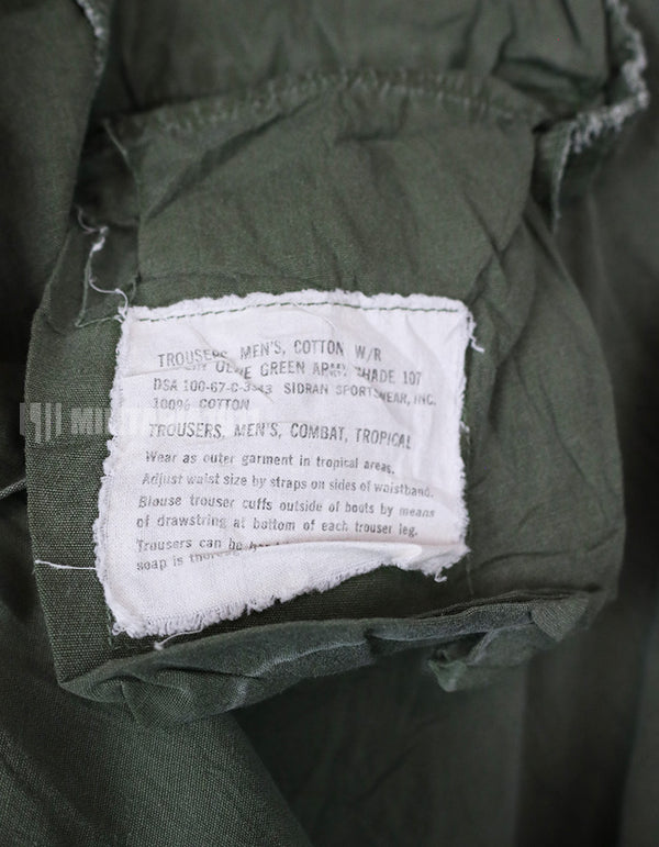 Original 2nd model of jungle fatigues pants, non ripstop fabric, used.