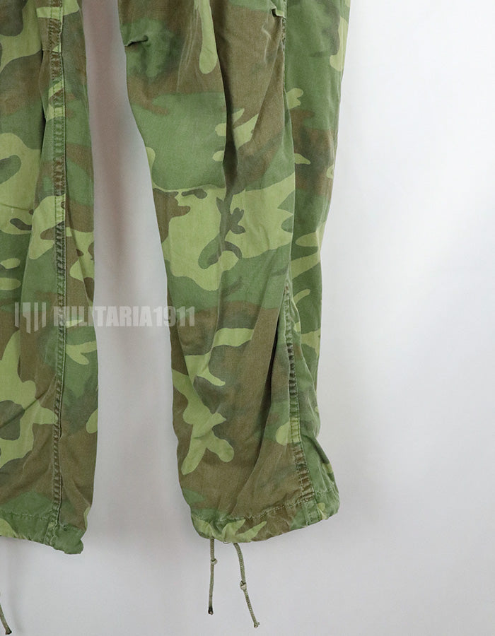 Original non ripstop fabric ERDL jungle fatigues pants, faded, scratched.