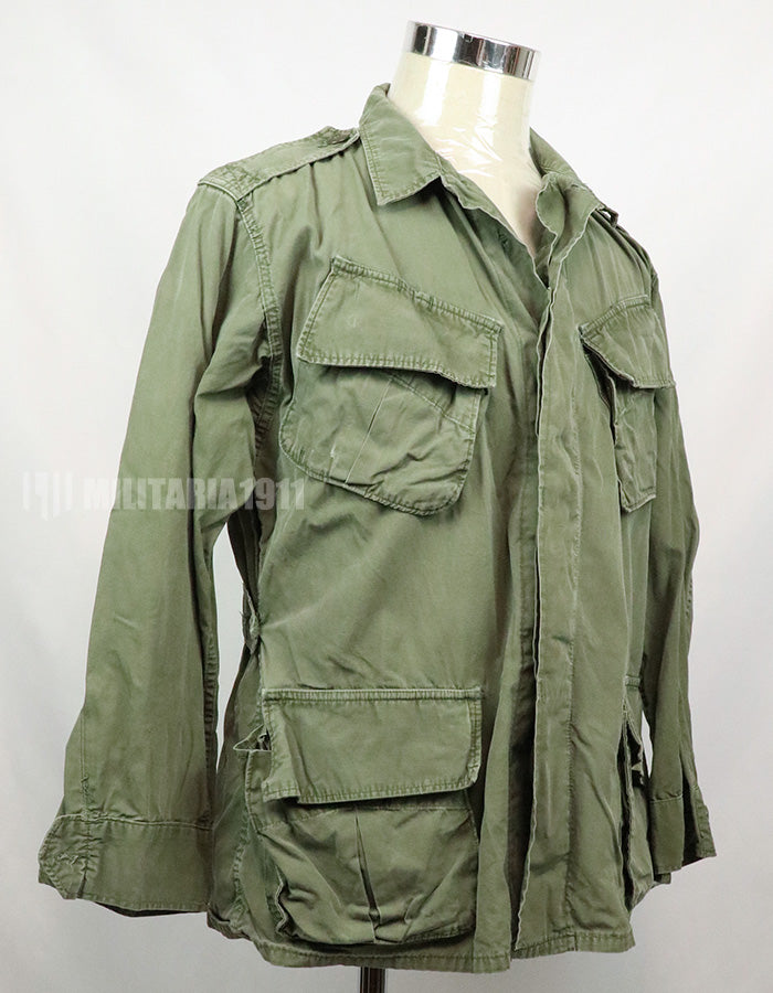 Real 2nd model jungle fatigues jacket, worn, scratched, faded.