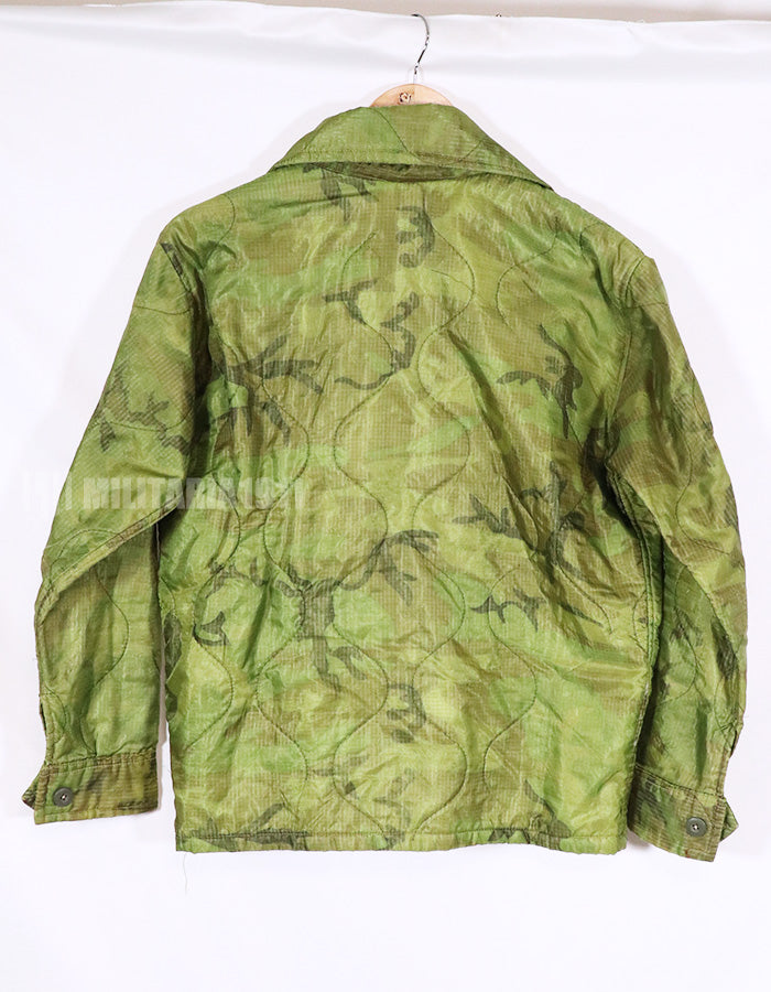 Real U.S. Army poncho, suvania jacket, no embroidery.