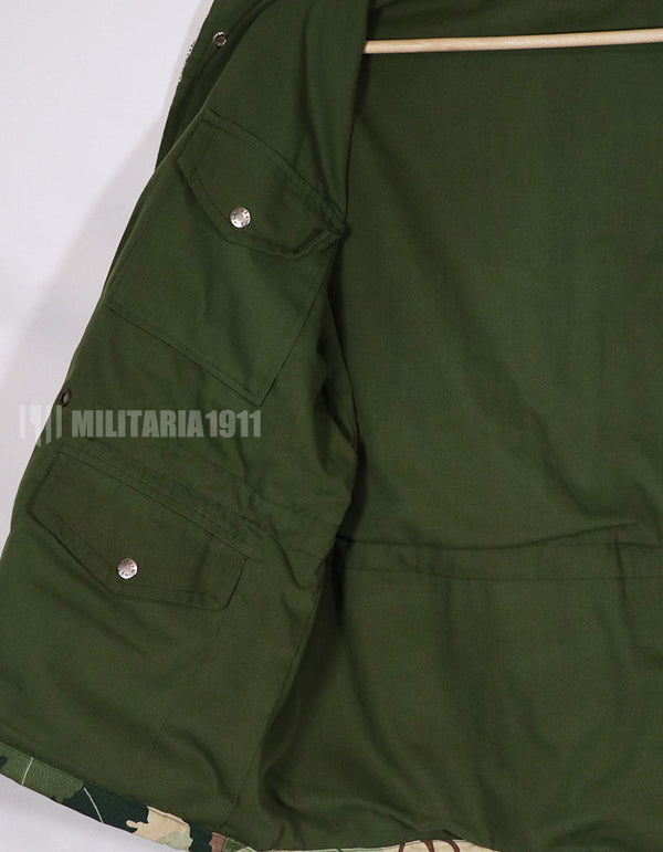 Civilian Vintage Mitchell camouflage M65 field jacket, used.